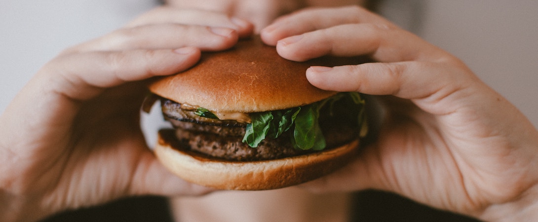 person-eating-a-burger